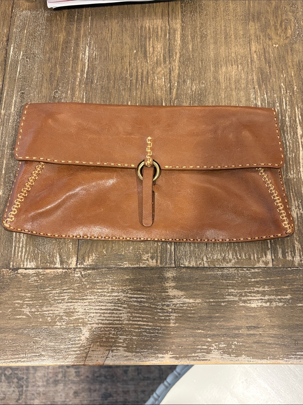 Johnny Farah Fold-Over Leather Clutch in Cognac
